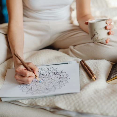 mandala woman sitting doing mandala