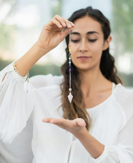 retreat dates woman holding pendulum
