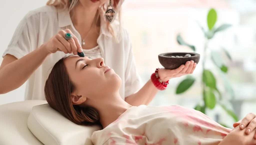 detox wellness retreat-woman doing crystal therapy