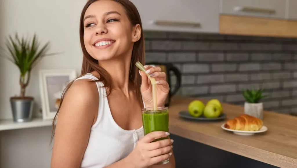 detox wellness retreat woman drinking juice