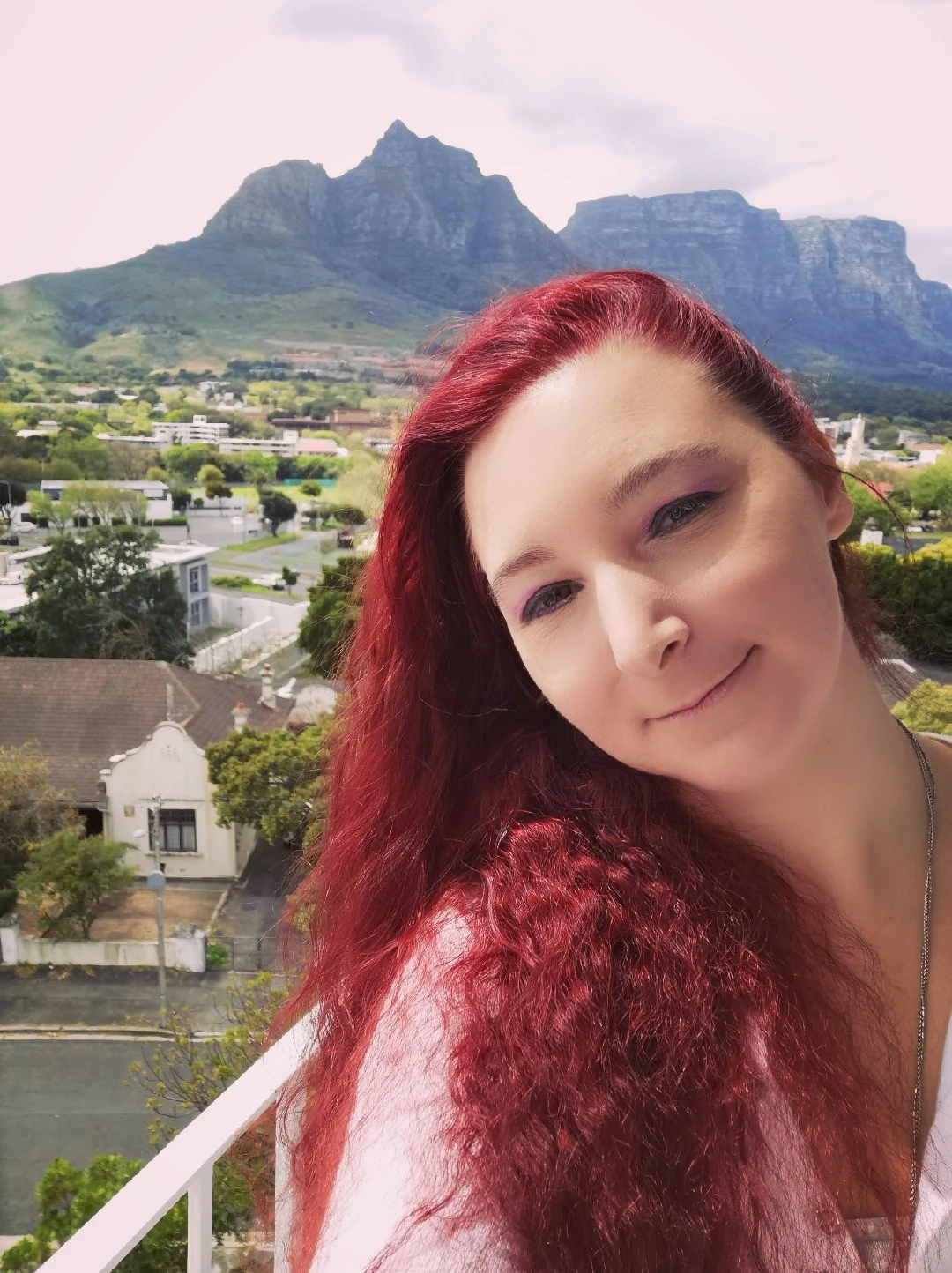 lara mirnik taking a selfie with cape town in the back