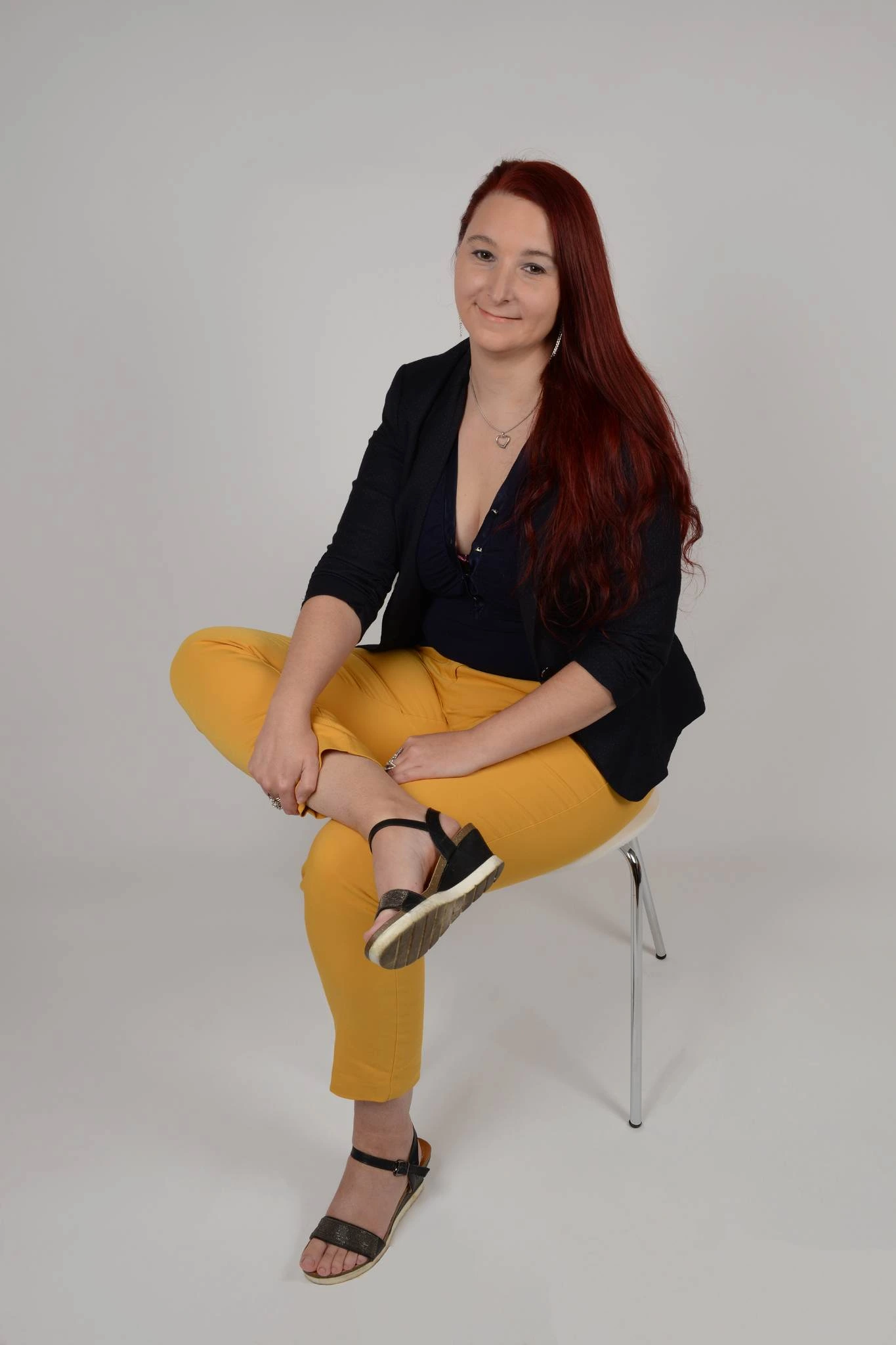 lara-mirnik-sitting-on-chair